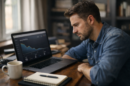 Small business owner reviewing website analytics on laptop looking for more leads